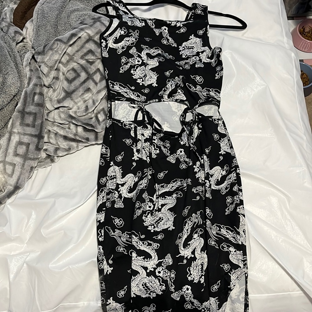 This dress is brand new. Tag is off but was never worn.